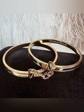 Victoria Secret goldtone, bangle set connected via chain bracelet